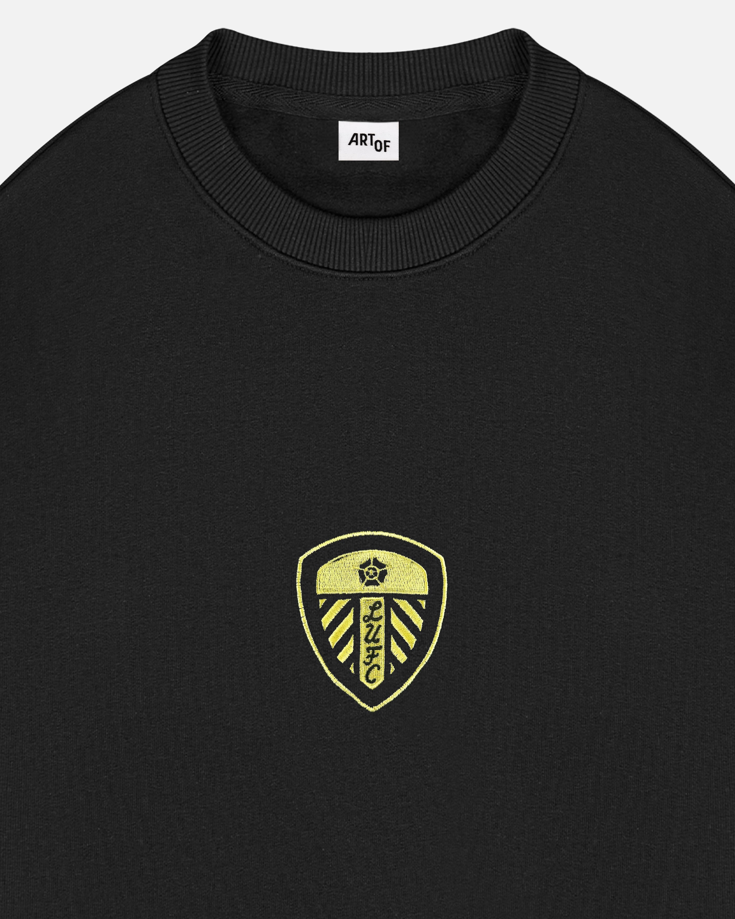 ART OF Leeds United Single Colour Crest Sweat | Black Football Jumper